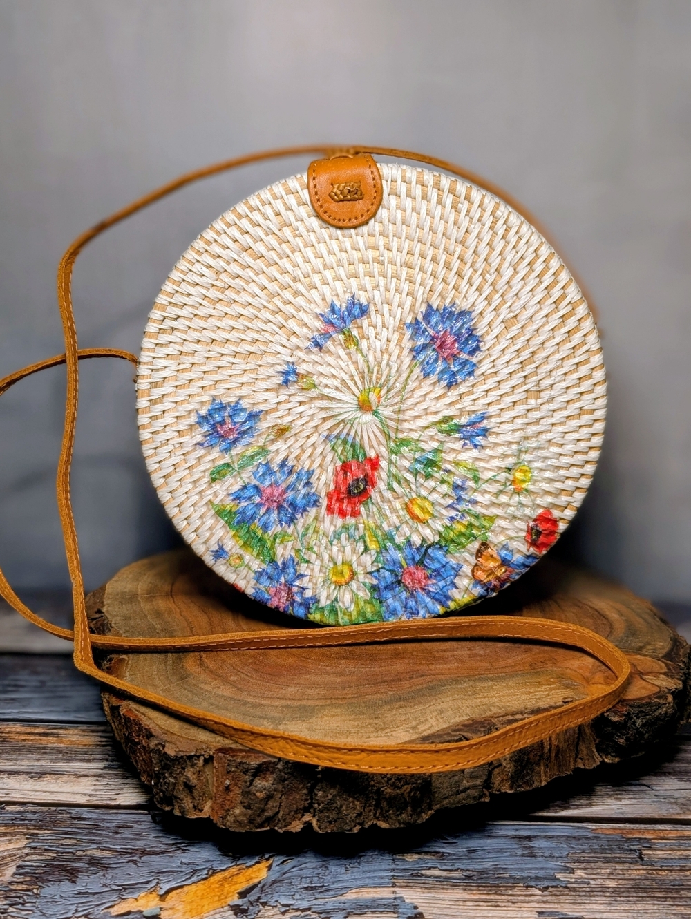 Handwoven Round Straw Crossbody Bag with Blue Floral Print